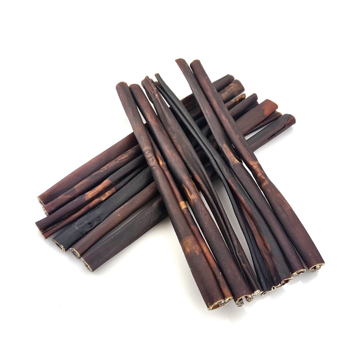 A bunch of Best Bully 12 Inch Peanut Butter Collagen sticks on a white surface.